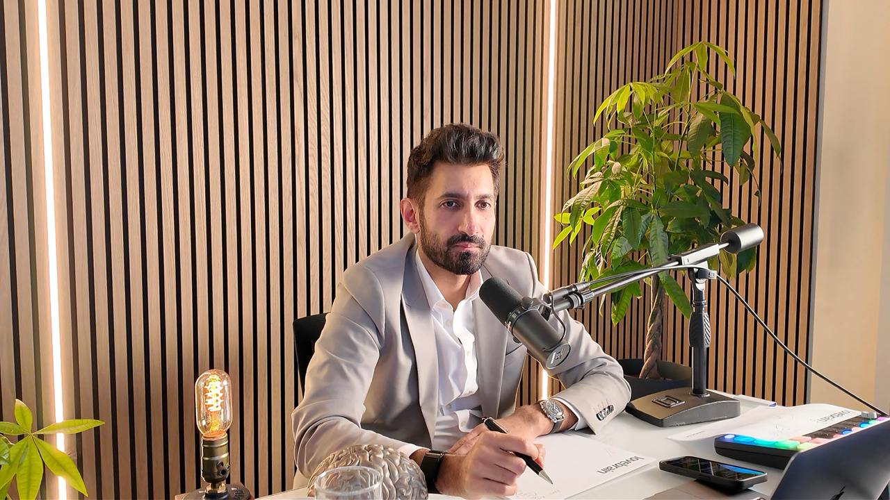 Yousuf Aslam speaking at a session